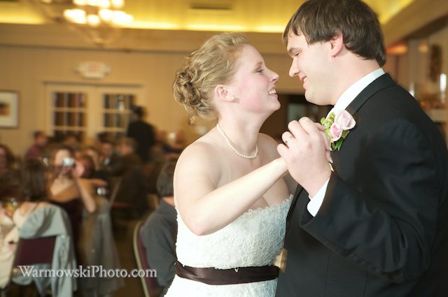 Jenni & Michael's friends were hooting and hollering after their first dance song. Copyright Warmowski Photography