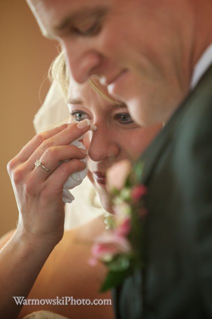 A favorite photo of the day, Genny Six cries as family and guests sing.