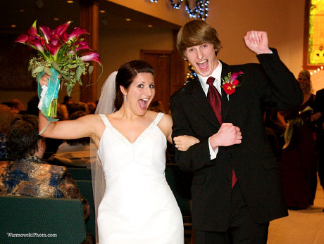 Megan & Adam Wardlow exit the church after their ceremony in Quincy.