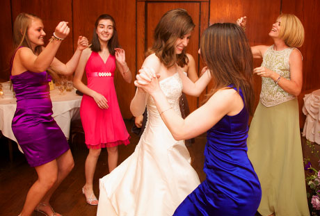 Pamela dances with her guests to music by Toast & Jam.