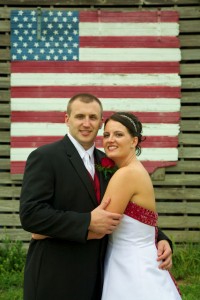 American flag on barn, backdrop for portrait