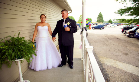 bride takes a deep breath before entering reception, wedding in Virginia Illinois by Warmowski Photography