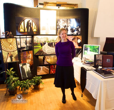 Tiffany in front of the Warmowski Photography booth at last year 39s show