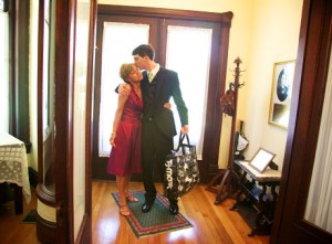 Woman kissed on forehead by son, Warmowskiphotography.com