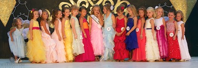 Princess contestants in dresses.