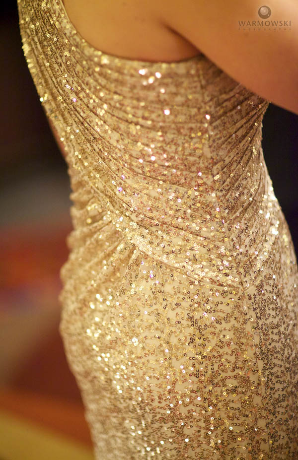 Margie wore a gold sequin dress.