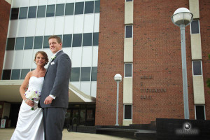 Sarah & Billy working Illinois State University's Stevenson Hall into their wedding photos.