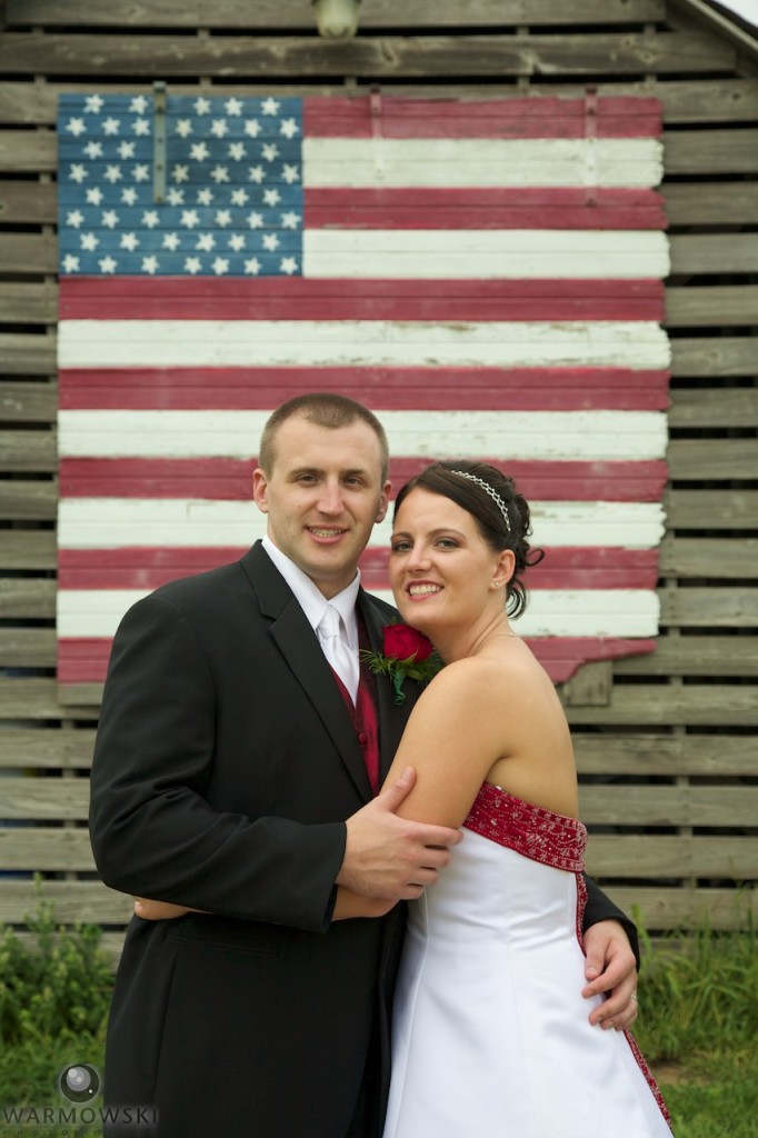 Kassie & Matt with an iconic folk ark flag at Buena Vista Farms.