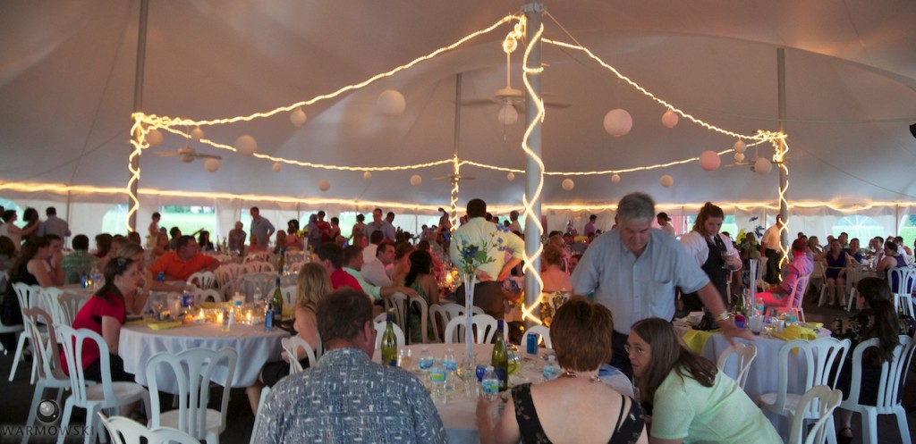 Wedding tent lit up at dusk for Ashlee & Justin's wedding. 