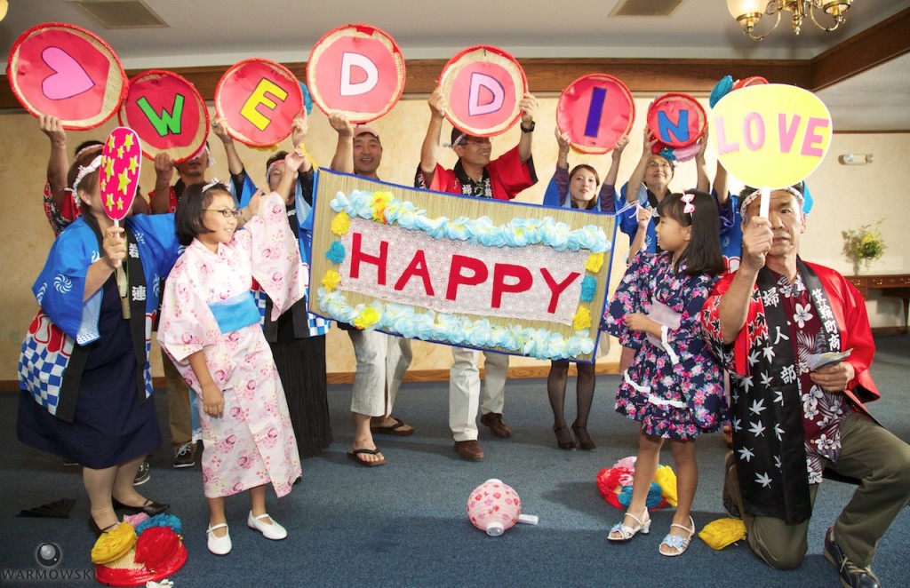 Shiori's family provides entertainment for wedding reception guests.