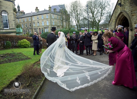 Our photo from Carolyn and Daniel's wedding in Buxton, Devonshire, England on our expo booth wall always gets attention. Photo by Steve/Warmowski Photography.