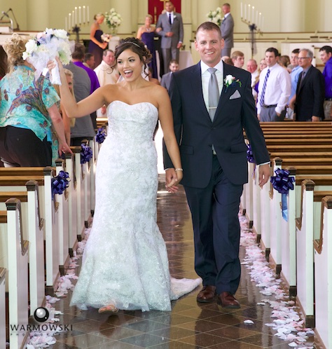 Adria and Jeremy walk down the aisle after their wedding at MacMurray College's Annie Merner Chapel. Wedding photography by Steve & Tiffany Warmowski.