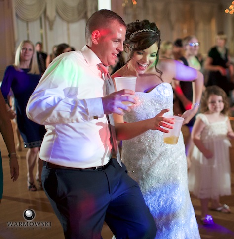 Dancing into the night at Hamilton's 110 North East. Wedding photography by Steve & Tiffany Warmowski.