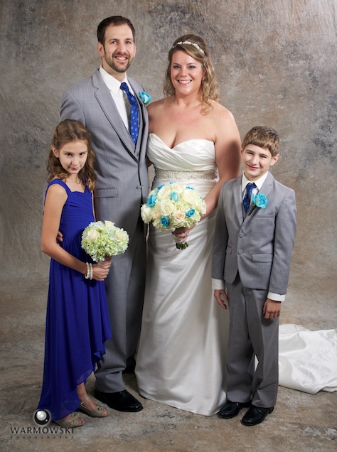 Lizzie & Brandon had family portraits at our studio before their wedding reception at The Elks. Wedding photography by Steve of Warmowski Photography.