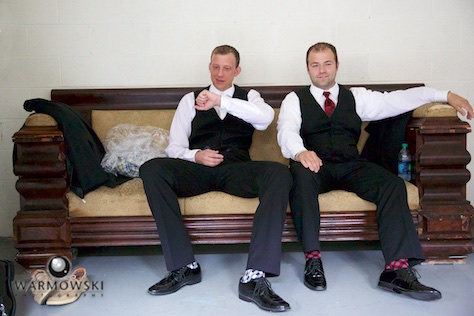 Ryan and his groomsmen are ready and waiting. Wedding photography by Steve & Tiffany Warmowski