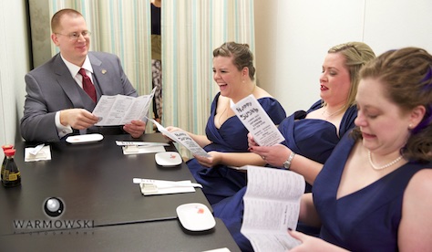 Ordering, Happy Sushi in Springfield. Wedding photography by Steve of Warmowski Photography.