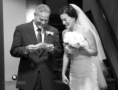 Emi's father has some humorous remembrances of the bride's childhood, last moments before walking out for the ceremony. Wedding photography by Steve & Tiffany Warmowski