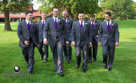 Reservoir Dog-esque entrance for the men, Amanda & Nick's wedding at the Jacksonville Country Club. Photo by Steve & Tiffany of Warmowski Photography.