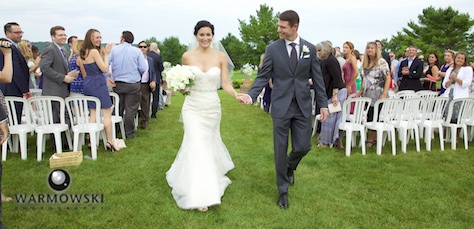 Emi & Daniel recess down the aisle, outdoor wedding at Geneva National Golf Club. Wedding photography by Steve & Tiffany Warmowski