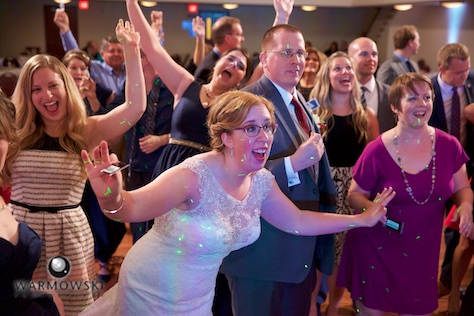 Amy & Ryan wedding reception at the Hoogland Center for the Arts in Springfield featuring live wedding band Fun DMC. Wedding photography by Tiffany & Steve of Warmowski Photography.