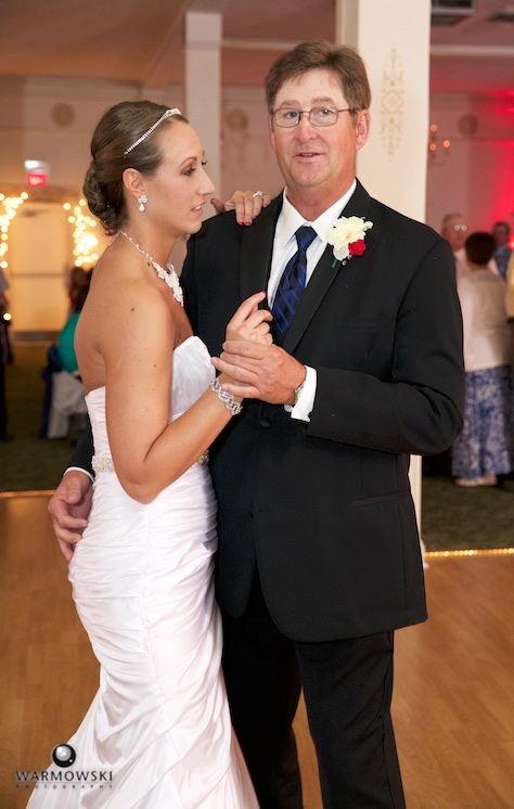 Amber starts her first dance with her father, Bill. Wedding photography by Steve & Tiffany Warmowski