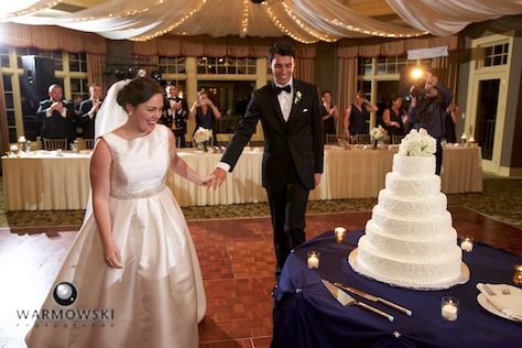 Elizabeth & Daniel move in for the cake cutting, wedding reception at Crystal Tree Country Club, Orland Park. Wedding photography by Tiffany & Steve & Warmowski.