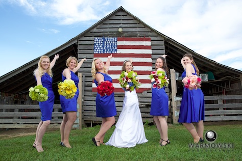 Kelly and her bridesmaids take advantage of a popular portrait spot at Buena Vista Farms. Wedding photography by Steve & Tiffany Warmowski