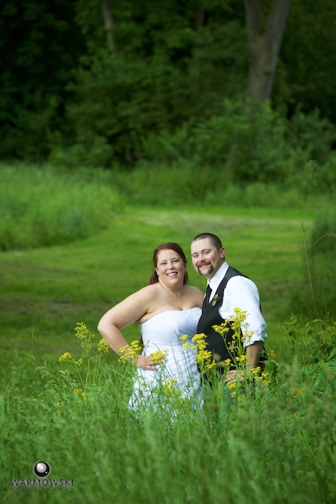 Sarah & Brandon take advantage of the beautiful scenery for wedding portraits at Buena Vista Farms in rural Jacksonville. Wedding photography by Tiffany & Steve Warmowski