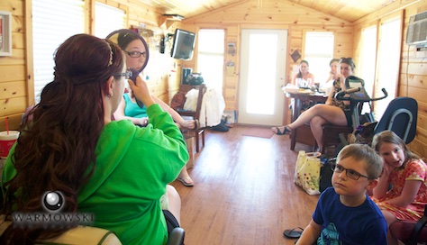 Bride gets ready in cabin serving as salon for her wedding day, Buena Vista Farms. Wedding photography by Steve & Tiffany Warmowski