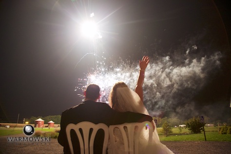 Mindi & Doug watch fireworks outside the tent on their wedding night at Buena Vista Farms. Photo by Tiffany & Steve Warmowski 