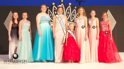 Morgan County Fair Junior Miss contestants in dresses (from left) Camille Brown, Rylie Bettis, Marlee Shucker, (2015 Queen Abby Tomhave/2015 Princess Naveah Benz), Abigayle Lewis, Brooklyn Clayton, and Kaylee Ford.