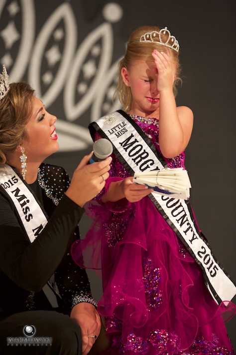 An emotional farewell from 2015 Princess Naveah Benz and 2015 Queen Abby Tomhave.